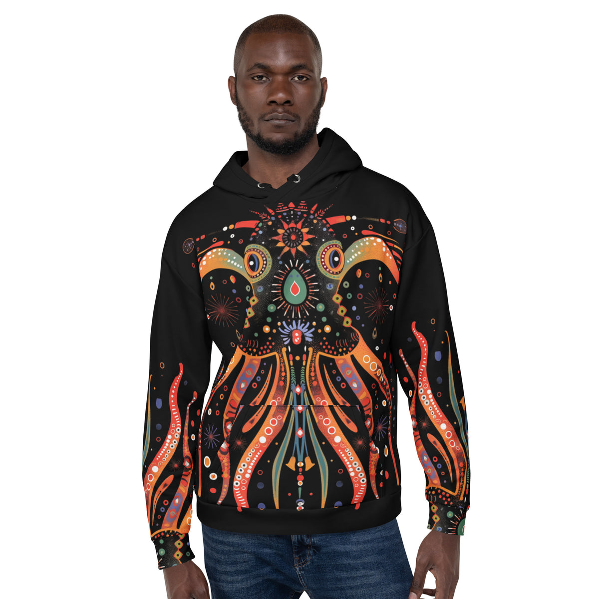 man wearing  Zuzuv Kraken Life black pullover hoodie featuring vibrant orange and multi-color mythical kraken formline artwork